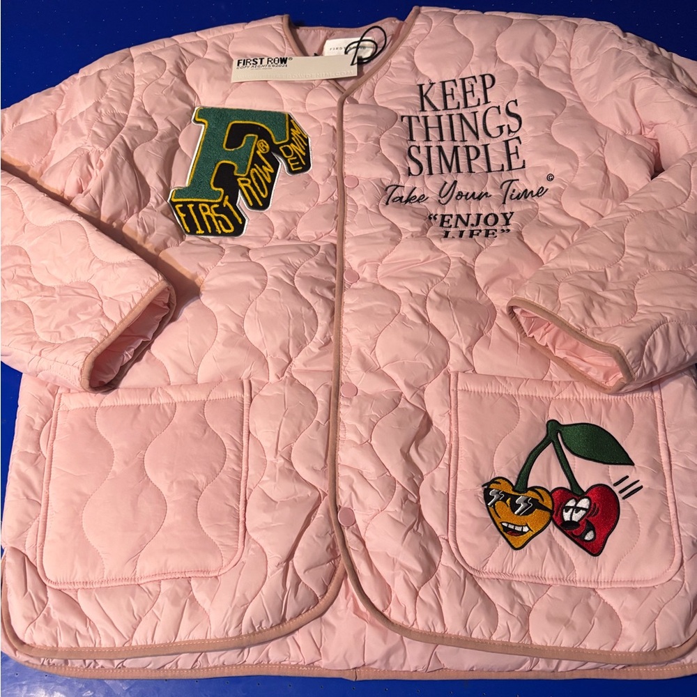 First Row pink jacket